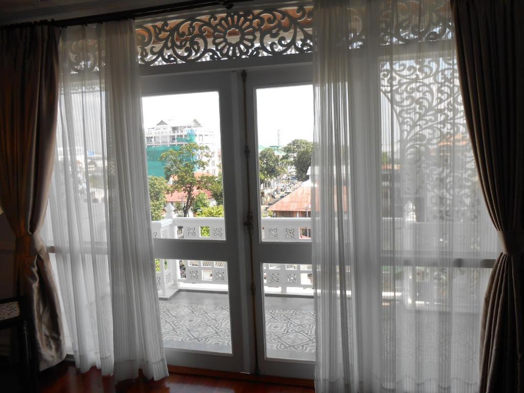 Dhavara Boutique Hotel Vientiane Værelse billede